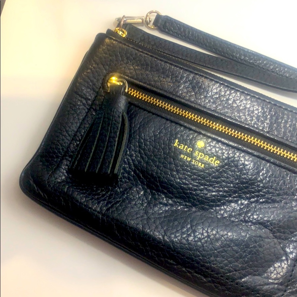 Kate Spade black wristlet with tassel
